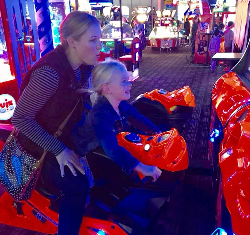 Riding on video game at dave and busters