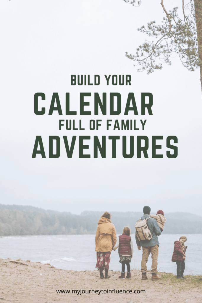 family standing on the shore on a calendar adventure