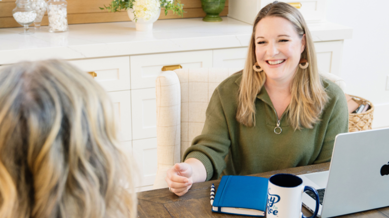 personal finance coach helping a client build a budget