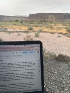 Drafting Teens and Money on a laptop during the writing trip